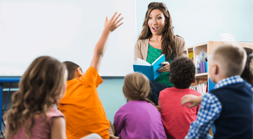 A teacher asking his students questions.