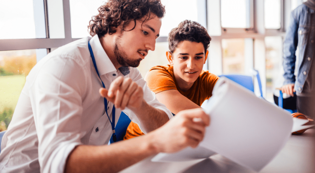 A tutor is explaining homework to a student.