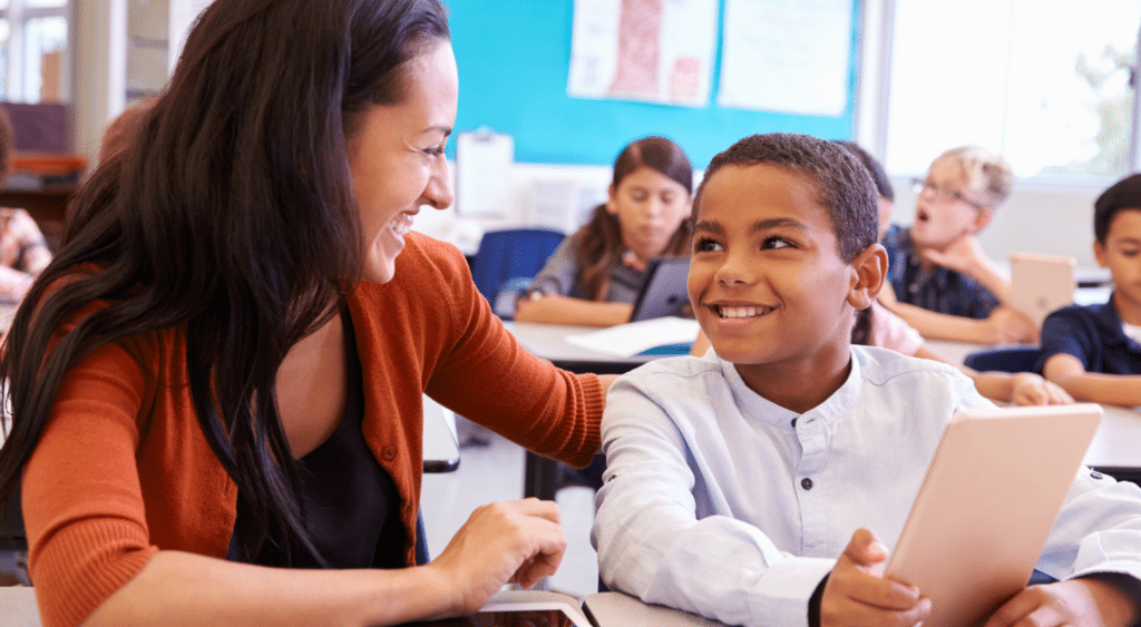 A Paraeducator with a student.