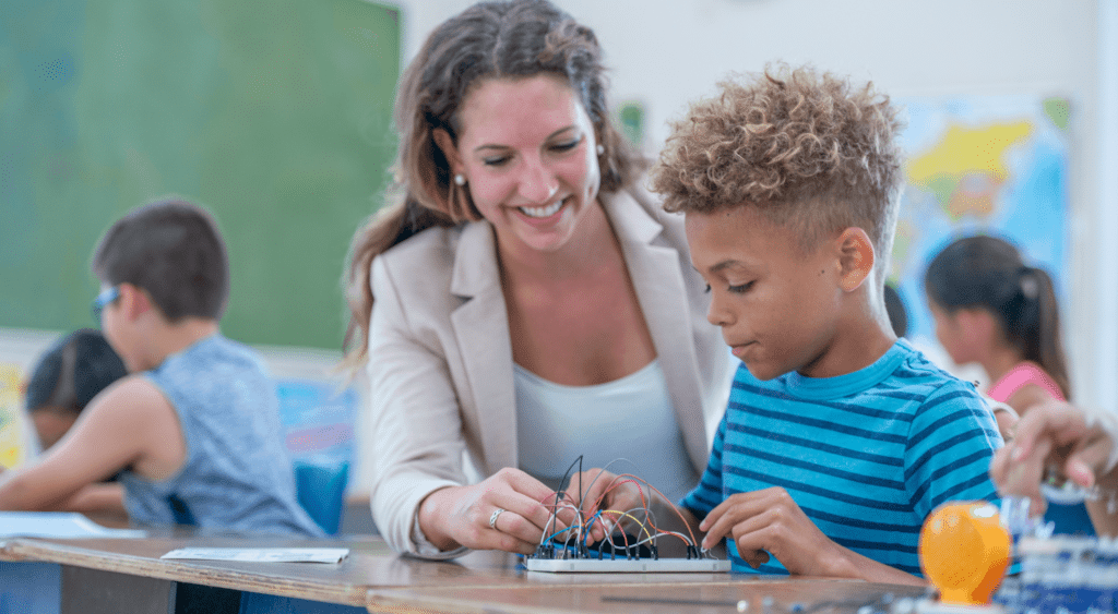 substitute teacher or paraprofessional with student