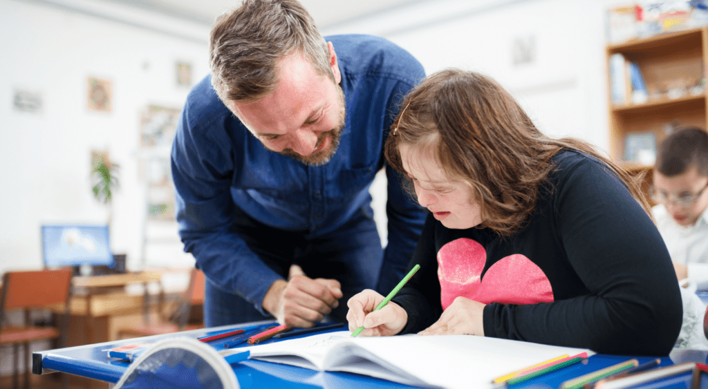 special education teacher and student with special needs