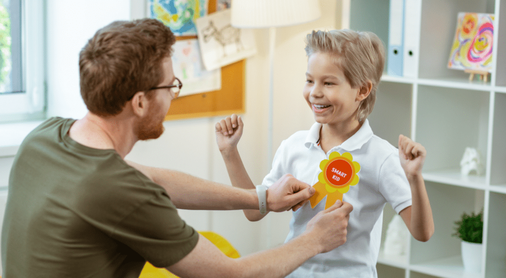 teacher rewards student for behavior