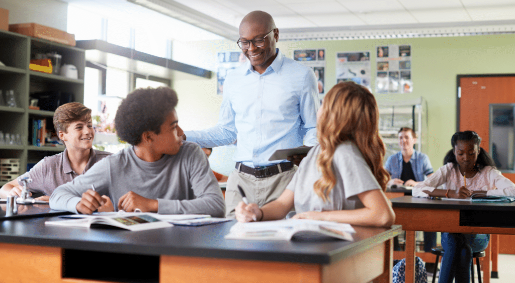 substitute teacher delivering sub plans in classroom